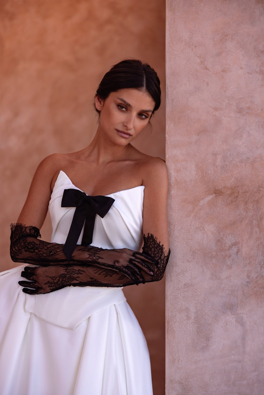 Strapless Ball Gown Wedding Dress with Black Bow and Corset